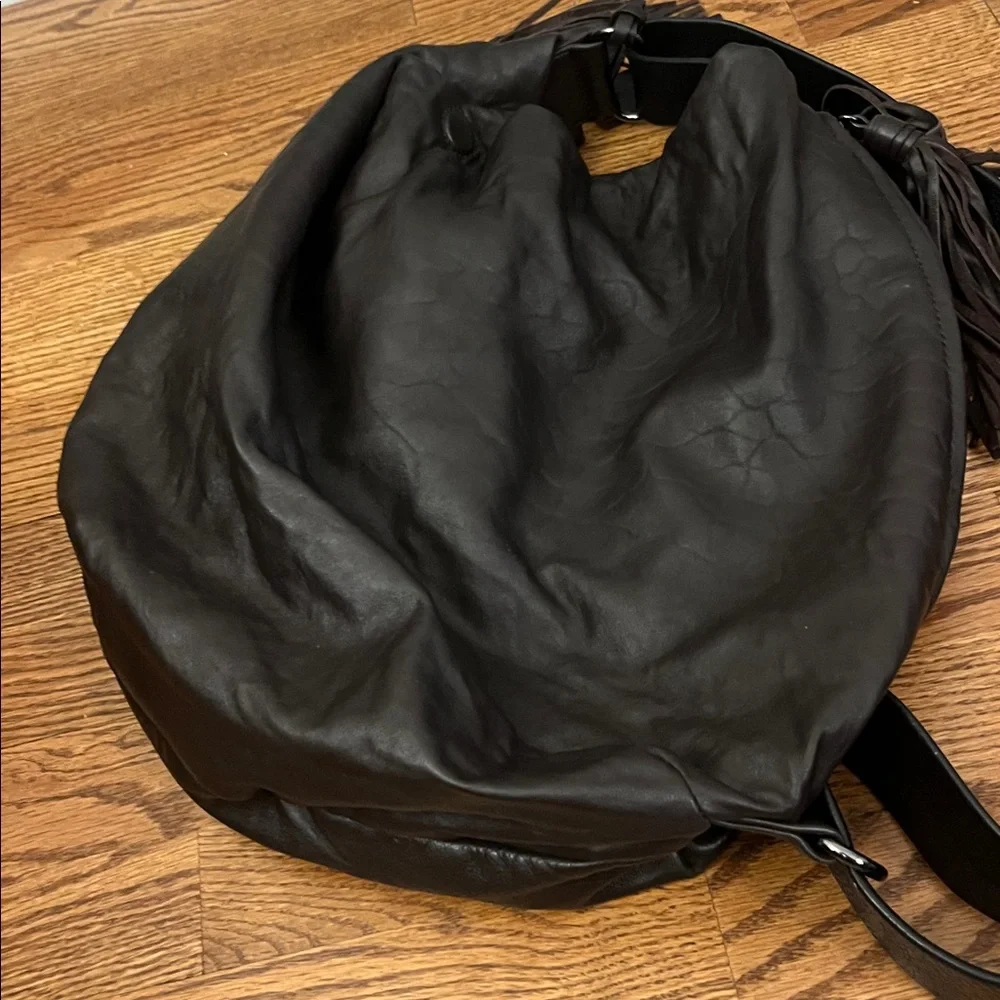 DanAzan slouchy one shoulder bag in brown leather with black adjustable strap